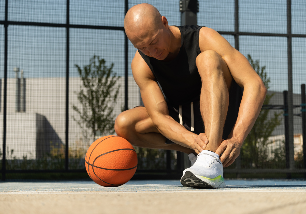 man hurt his ankle playing basketball